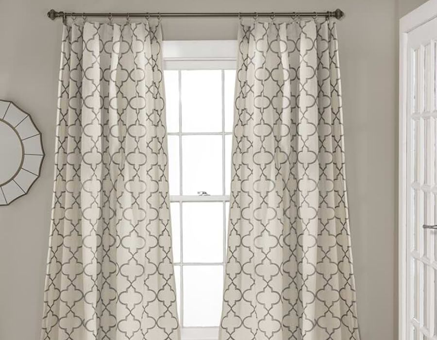 Patterned drapery panels on decorative rod